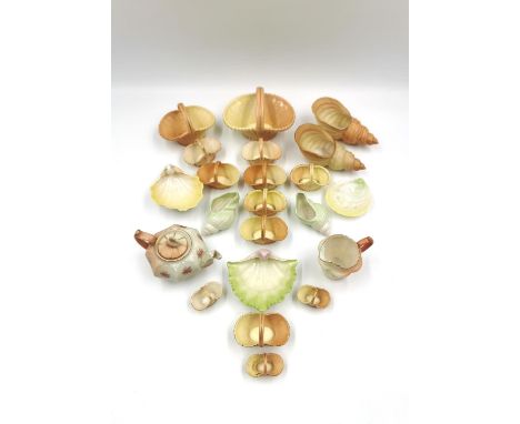 A collection of 19th century Royal Worcester baskets and shells and an Royal Ivory blush teapot and creamer. Largest 12 x 7.5