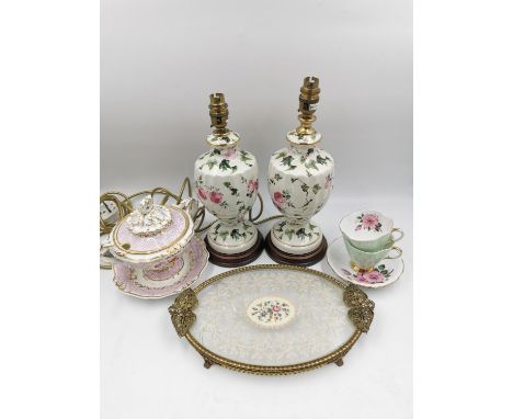 A collection of 19th century and later porcelain to include, a lidded twin-handled tureen with hand painted floral and gilt d