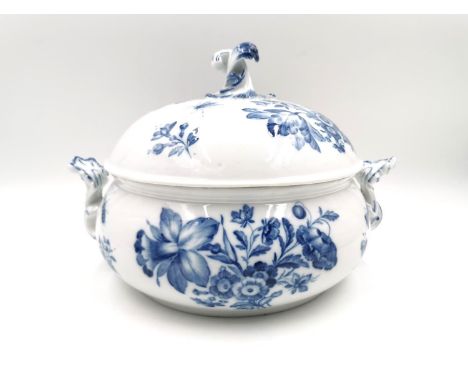 An early 19th century Meissen tureen with cover, painted with flowers and insects with a twisted sheath finial. With marks in