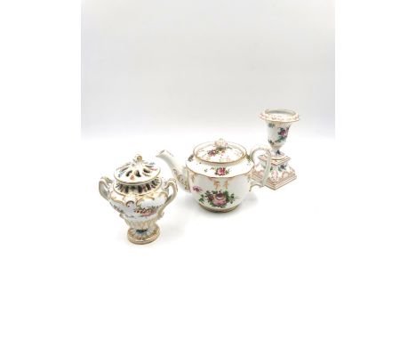 A small collection of miniature hand painted and gilt porcelain to include a teapot, a lidded potpourri, and an urn on a plin