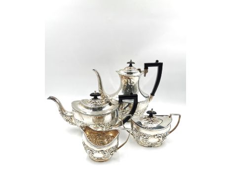 A De Montfort silver on copper four piece tea service consisting of a teapot, coffee pot, creamer and sugar pot, with moulded