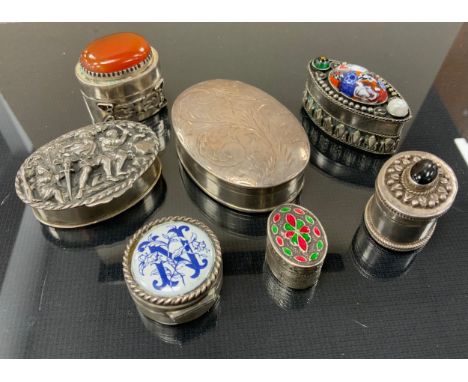 An oval silver pill or snuff box, import marks, London 1992; others embossed , carnelian topped, etc, white metal (7) 