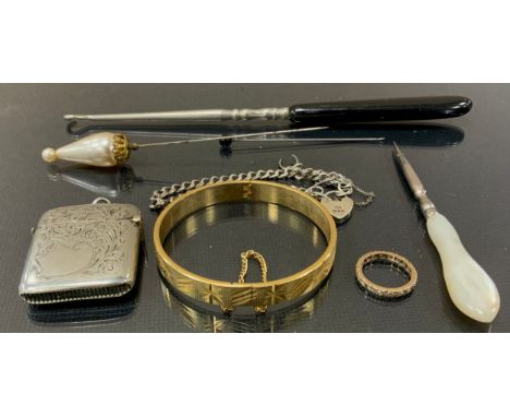 Jewellery - a 9ct gold synthetic spinel eternity ring, stamped 9ct,  rolled gold hinge bangle, white metal vesta case, etc 