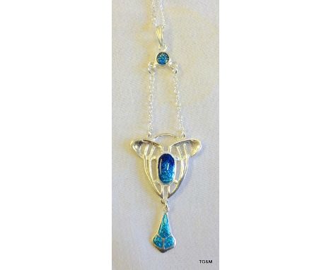 A silver and enamel art nouveau style pendant necklace