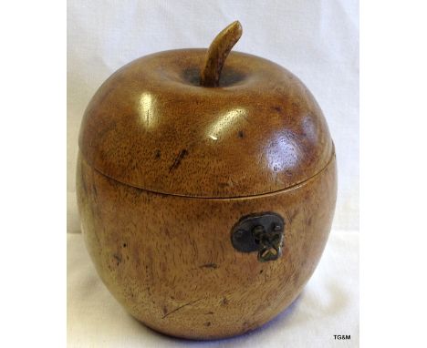 A fruitwood tea caddy in the shape of an apple