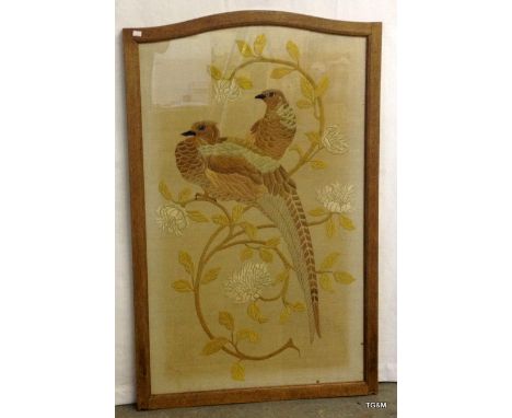 An Oak framed silk tapestry of 2 pheasants 107 x 67cm