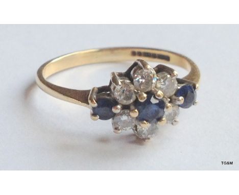 A 9ct gold sapphire and diamond ring size K