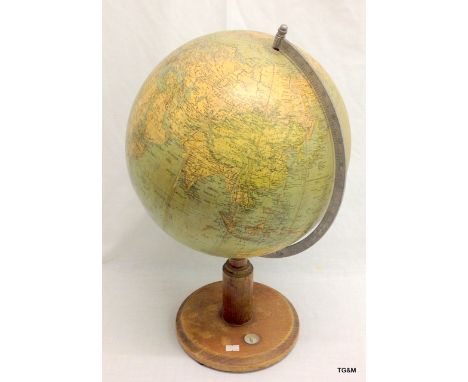 A German 1930's Globe on a wooden stand with inset compass