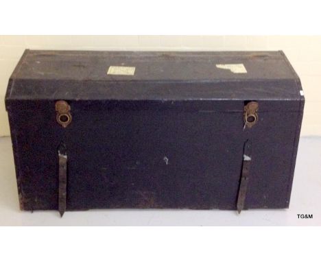 A very large black car trunk