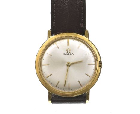 Omega: A gold plated manual wind wristwatchThe silvered dial, with applied gold tone baton hour markers, outer minute track, 