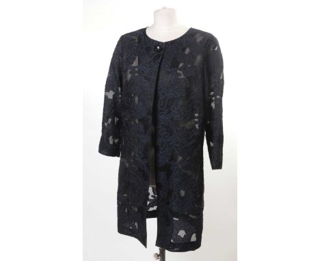 A St. John Couture evening coatThe navy blue metallic organza collarless coat, with delicatedly applied jaquard scroll leaf d