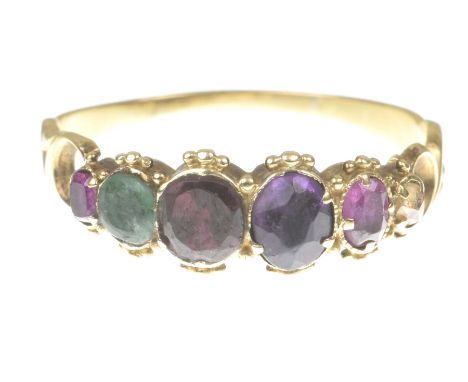 An early 19th century 'Regard' ringThe graduated foiled closed back ruby, emerald, garnet, amethyst, ruby and diamond line ac