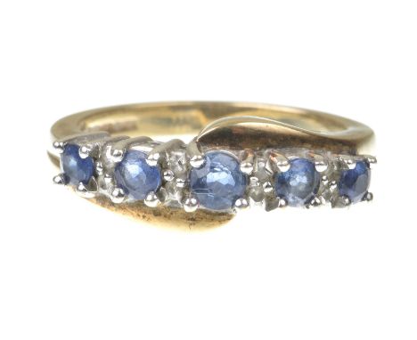 A sapphire and diamond ringThe graduated circular shape sapphires with single-cut diamond highlights to a 9k gold shank, ring