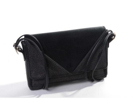 A vintage Yves Saint Laurent cross body bag The black leather and purple/red woven panelled bag, with black leather trim, and