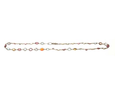 A multi-gem set necklaceSet with vari-shaped gem stones in a riviere style setting, to include, zircon, carnelian, moonstone 
