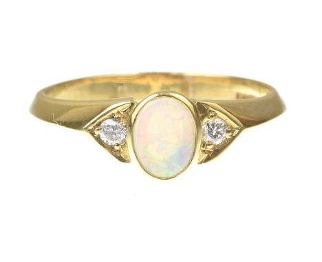 An opal and diamond ringThe oval opal cabochon flanked by two round brilliant-cut diamonds, to an 18k gold shank, ring size O