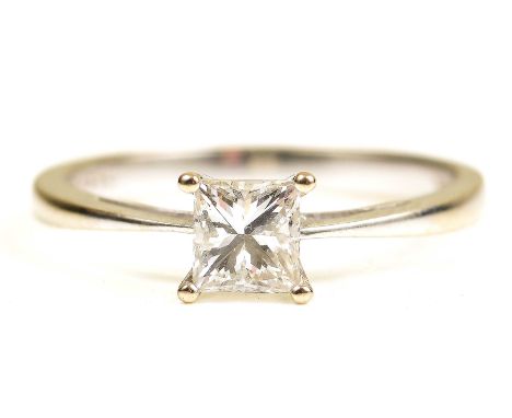 A diamond single stone ringThe princess-cut diamond, claw set, to an 18k white gold shank, diamond weight approx. 0.50ct, rin