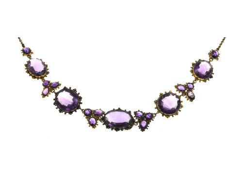 An early 19th century amethyst neckletThe alternating links composed of oval mix-cut amethysts and oval mix-cut amethyst clus