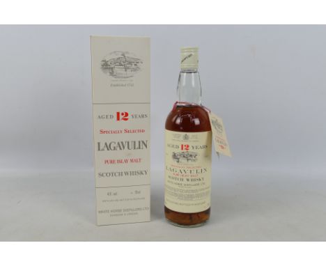 Lagavulin 12 Year Old, White Horse Distillers Ltd, 43% ABV, 75cl, likely a 1980's bottling, level upper shoulder, contained i