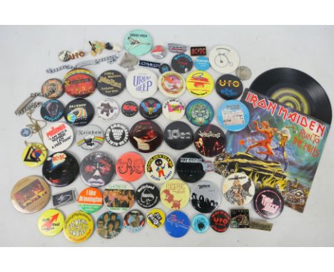 A collection of vintage pin badges, predominantly relating to music / rock bands, to include Black Sabbath, AC/DC, Judas Prie