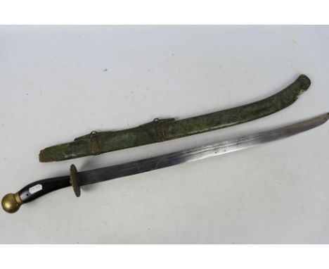 A liuyedau style sword with wood and brass hilt, 60 cm (l) blade, with scabbard, 75 cm (l) overall.Note: This lot is not for 