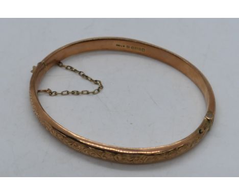  A 9 carat rose gold bangle stamped 9; .375, approx 5.91 gm