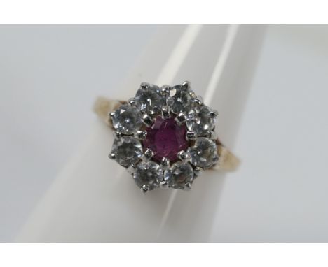 A 9ct yellow gold ruby and cz cluster ring, size M, approximately 3.4 grams all in.