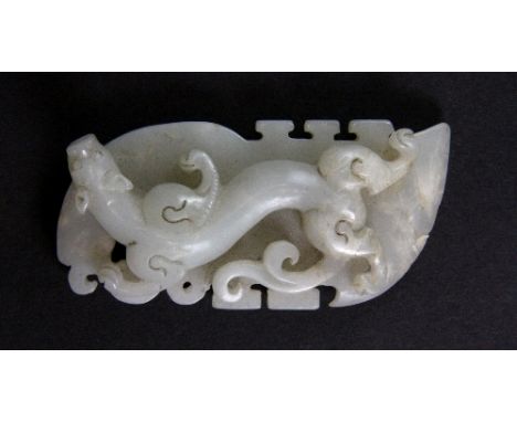 A 19th century Chinese carved white jade dragon sword amulet, L 8cm
