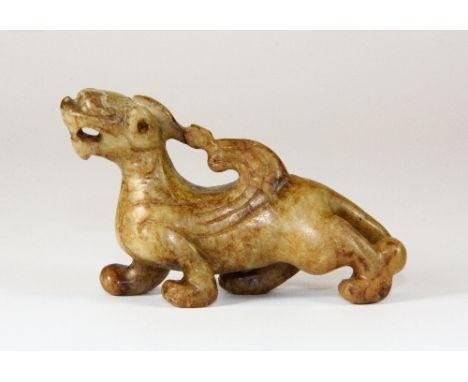 A Chinese carved jade/hardstone figure of a dragon, L 7cm, H 4.5cm
