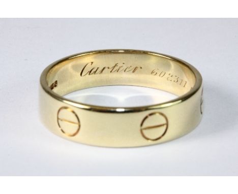 An 18ct yellow gold gents Cartier love ring. Size Y