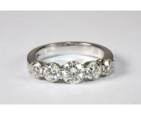 A superb 18ct white gold 5 stone diamond ring total weight approx. 2.1ct, centre stone approx. .75ct (M)