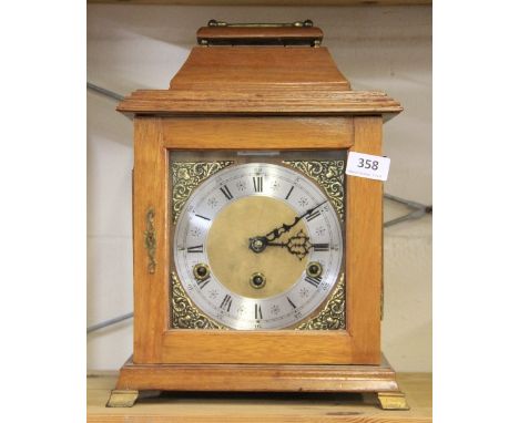 A chiming bracket style mantle clock
