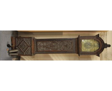 An 18th century brass dial carved oak long cased clock with date and second hand by William Grimes of London, H 223cm