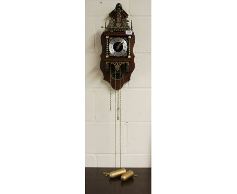 A Dutch mahogany and brass double weight wall clock