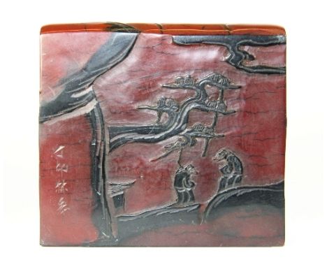 A large Chinese mixed colour soapstone seal, 12cm x 13cm x 2.5cm