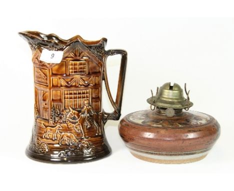 A musical ceramic jug and a studio pottery oil lamp base