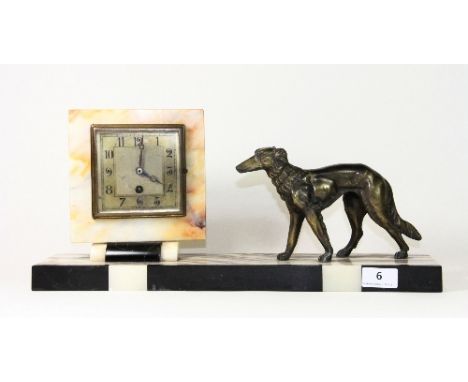 An Art Deco marble and spelter mantle clock, W 45cm