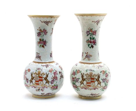 A pair of Samson vases, in Chinese export style, with coats of arms and coloured and white enamelled decoration and pseudo se