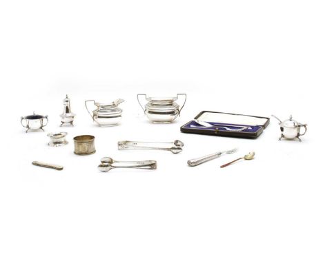 Silver items, late Victorian and Edwardian, comprising: a spoon/fork christening set (cased), a silver cream jug and sugar bo