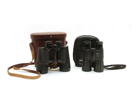 Two pairs of Carl Zeiss binoculars, 10 x 50w Jenoptem and 10 x 48B TP, both in cases, together with a monocular telescope 20-