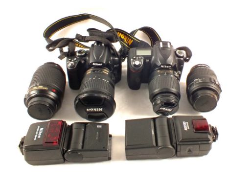 A case containing Nikon D5000 and B50 cameras with AFS Nikkor 10-2.4mm 1:3.5-4.5 GED and Nikon DX AF-S Nikkor 18:55mm 1:35-5.