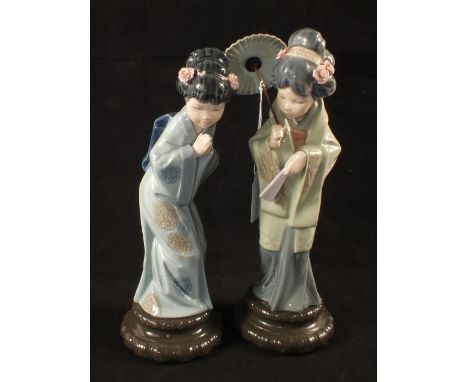 A pair of Lladro figurines of Japanese maidens