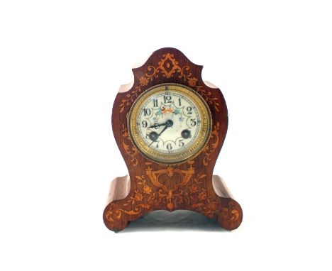 An Edwardian inlaid Rosewood mantel clock of waisted form and floral enamel dial