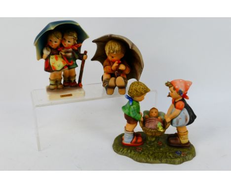 Goebel - Three Hummel figures / groups to include 1996 Berta Hummel # BH10 Special Delivery, Stormy Weather and Umbrella Boy,