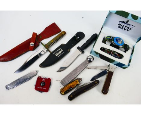 A collection of vintage knives, multi-tools and similar and a boxed watch and knife set. [W]

Note: This lot is not for sale 