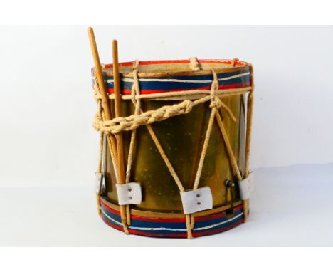 A vintage marching drum, approximately 37 cm x 38 cm. [W]