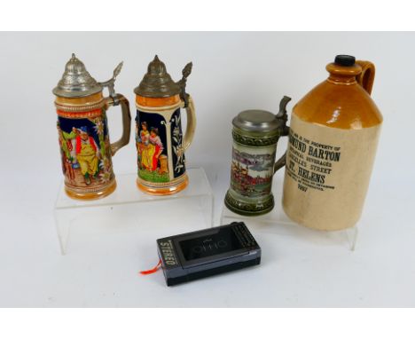 Lot to include steins, stoneware jug for Edmund Barton Botanical Beverages, St Helens and a Hitachi portable stereo. [W]