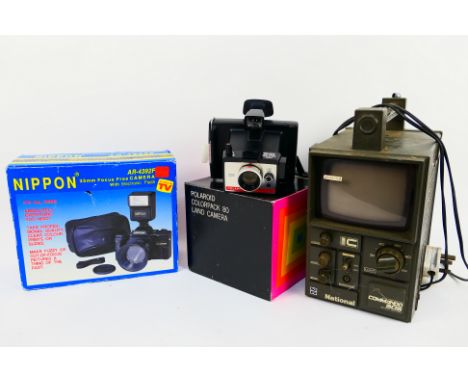 A vintage National (Panasonic) Commando 505 transistor television, cameras. [W]
