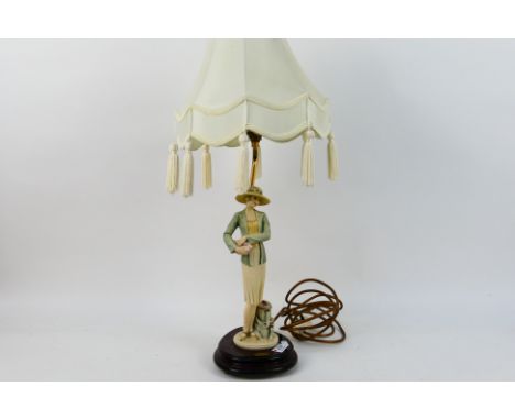 A Giuseppe Armani Florence figural table lamp with shade, approximately 47 cm (h) to top of light fitting. [W]