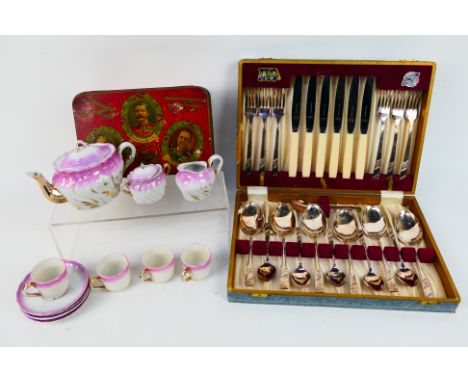 Viners Silver Rose pattern cutlery for six settings, cased and a child's tea set. [W]